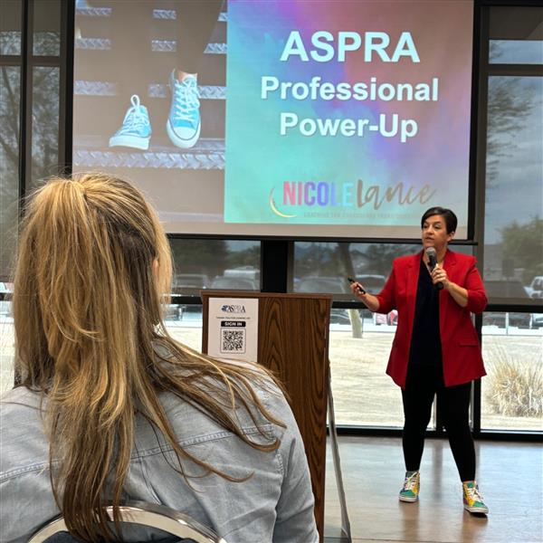  ASPRA quarterly meeting speaker presents to group